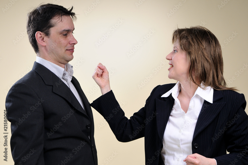 business man and woman fighting with crisis business man and woman fighting with crisis