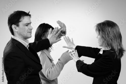 three business people in office conflict photo