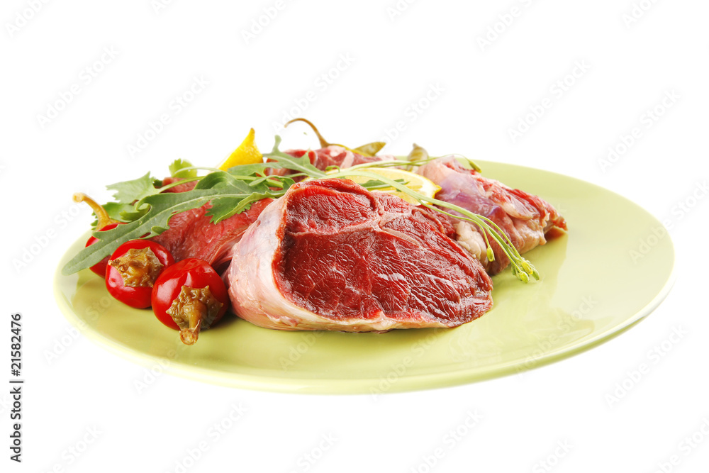 Fototapeta premium raw beef medallion on green