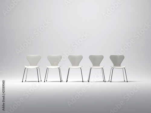 Schilderij op canvas Row of five white plastic and metal chairs