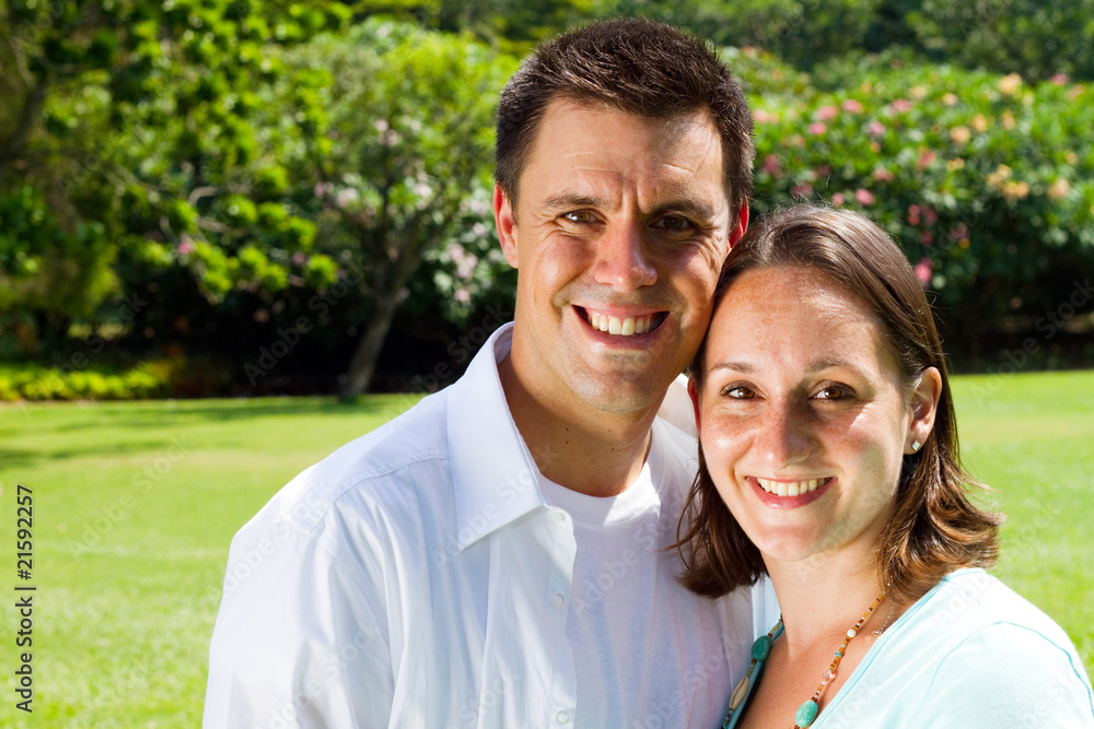 happy young couple in park happy young couple in park