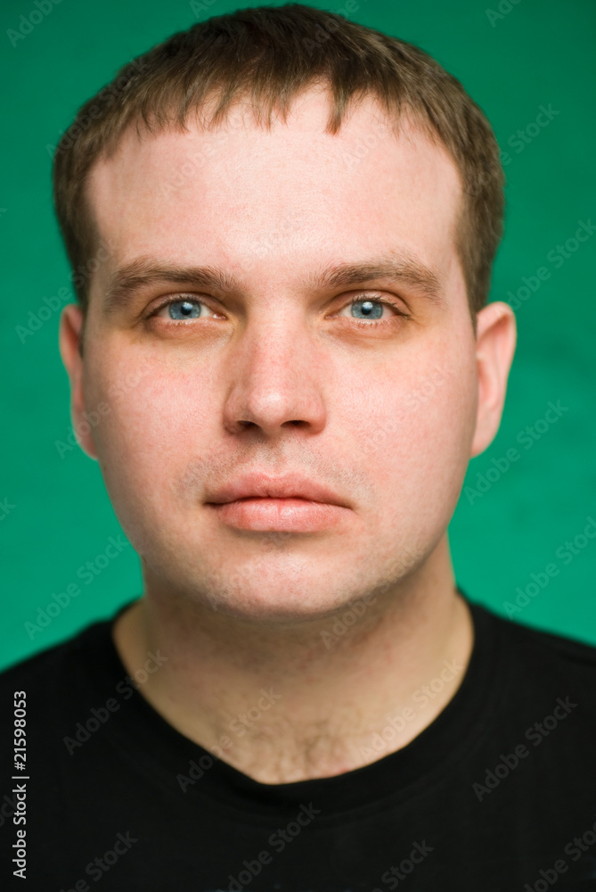 Fototapeta premium Portrait of the serious young man