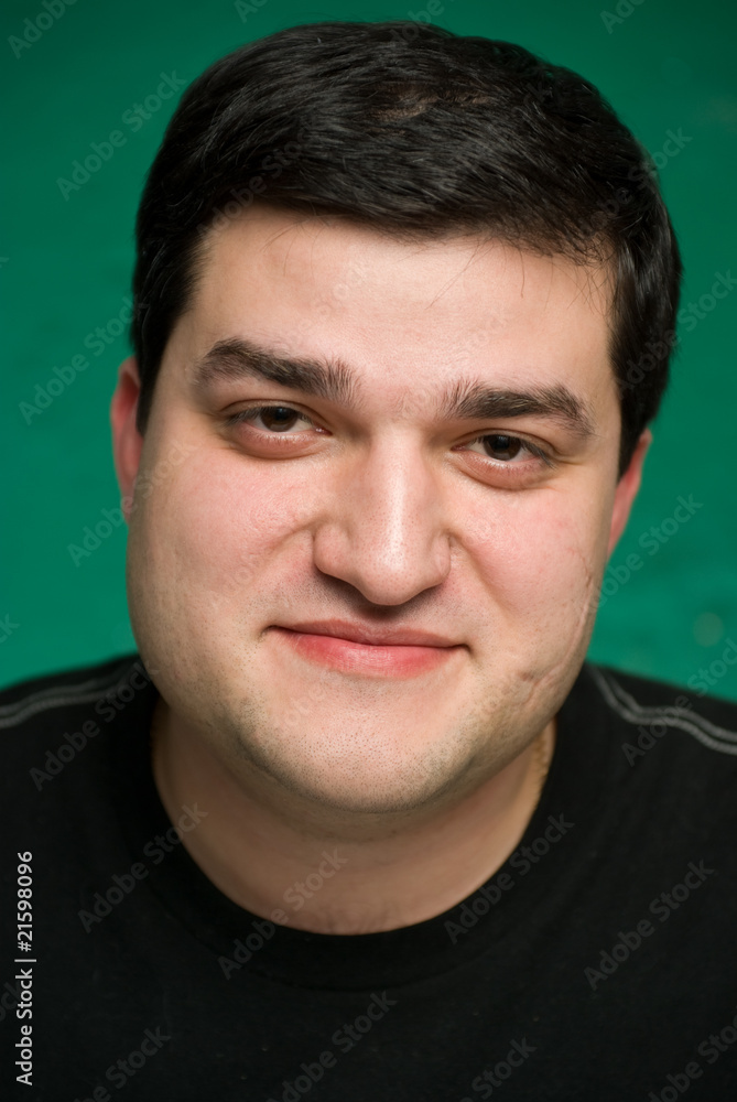 Fototapeta premium Portrait of the smiling young man
