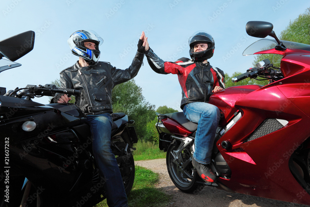 two motorcyclists greetings on country road two motorcyclists greetings on country road