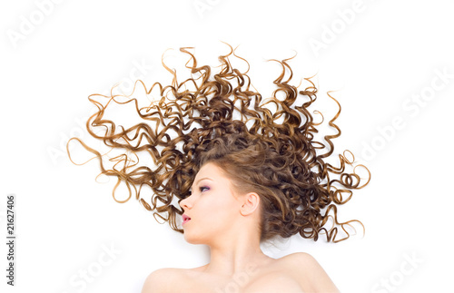 Beautiful woman with long curly hair