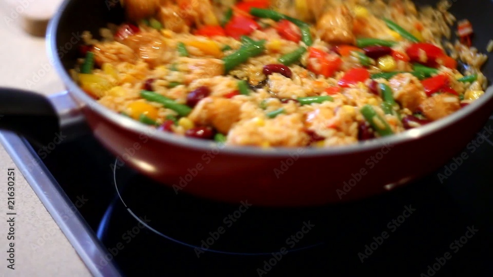 Cooking Mexican food on hot frying pan Cooking Mexican food on hot frying pan