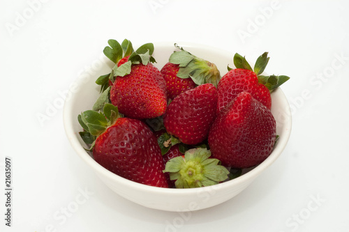 Strawberries isolated over white background.
