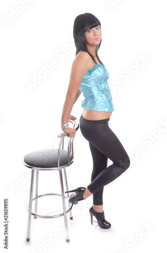 Pretty girl posing with stool