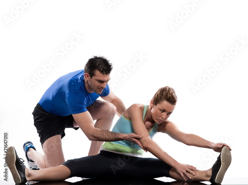 stretching posture by a couple on studio white background photo