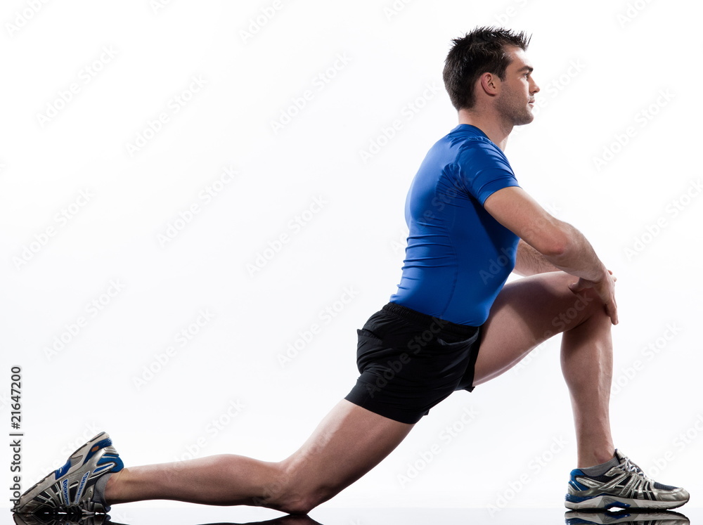 Obraz premium stretching workout posture by a man on studio white background