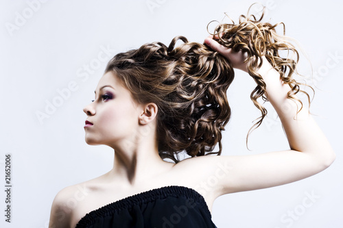 Beautiful woman with long curly hair