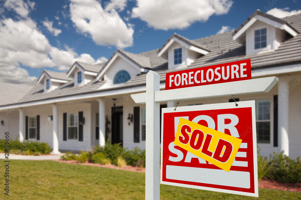 Sold Foreclosure Real Estate Sign and House - Right Sold Foreclosure Real Estate Sign and House - Right