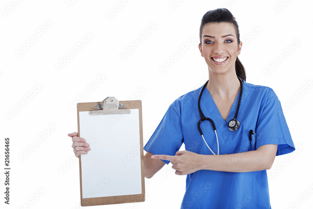 Portrait of young nurse pointing blank clipboard