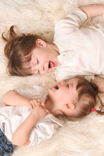 Two girls laughing