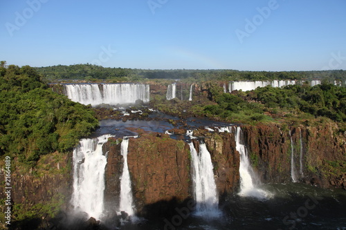Iguassu waterfalls on a sunny day early in the morning.