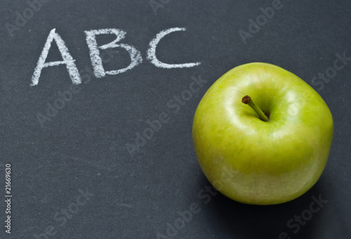 Blackboard with apple