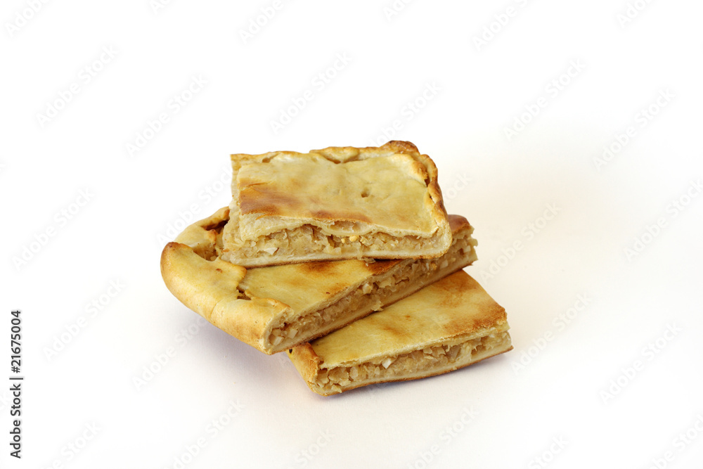 Baked cabbage pie on white background Baked cabbage pie on white background