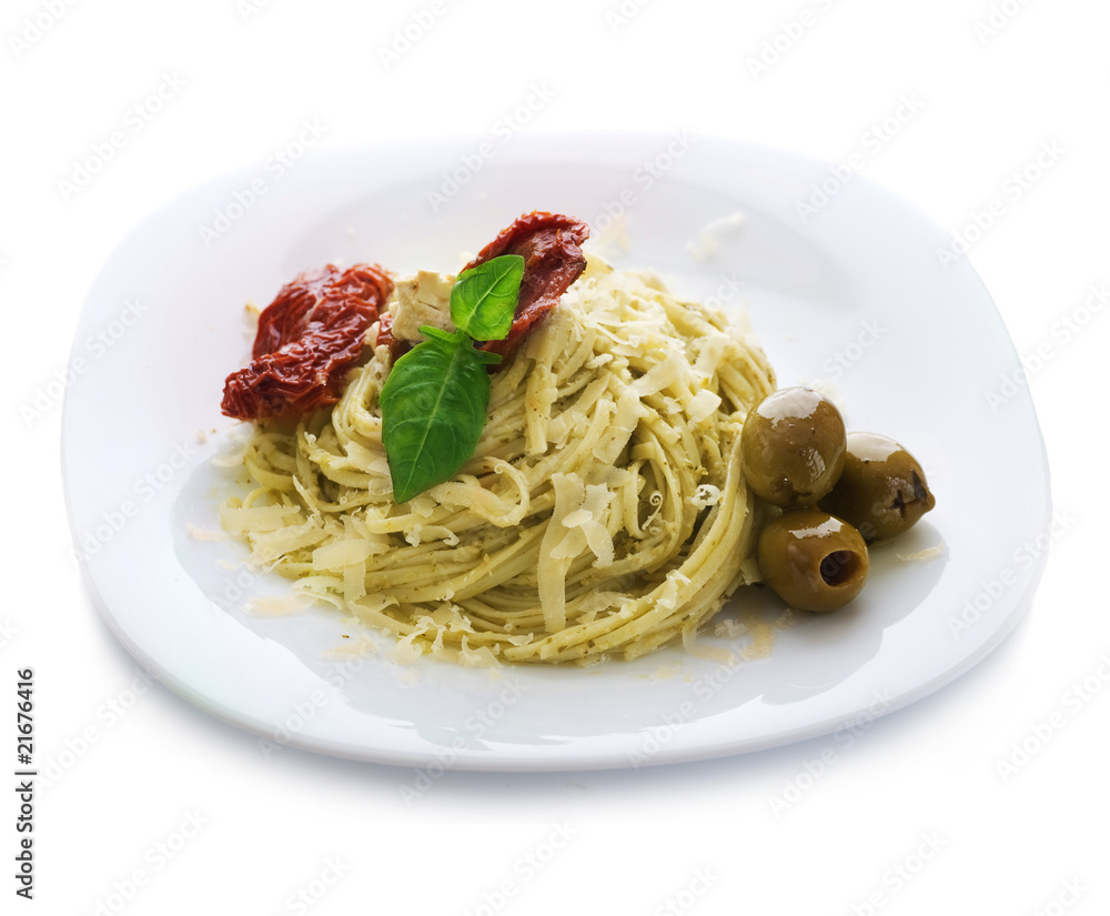 Italian Pasta with Pesto sauce,olives,basil and dried tomato