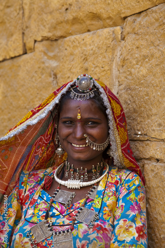 indian woman with traditional Rajasthani clothes and jewelry.