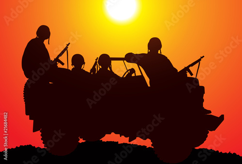 Marines. Silhouette of soldiers on the vehicle