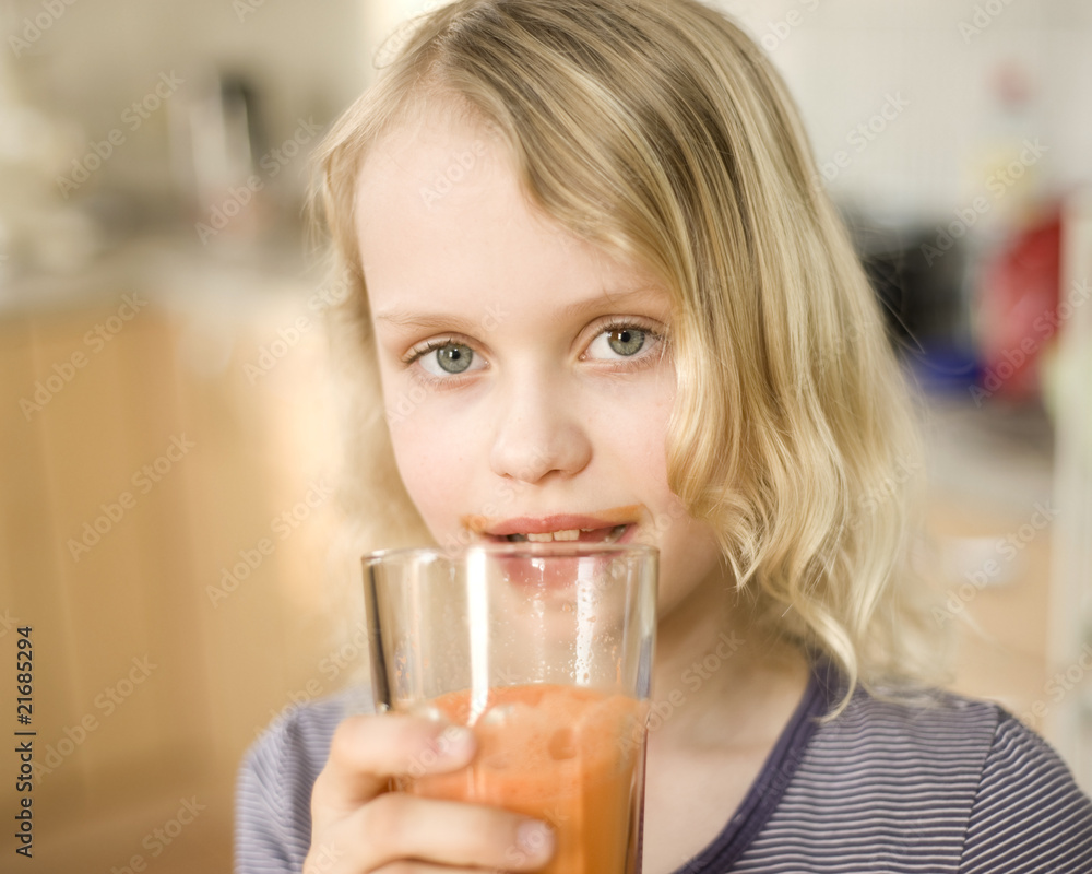 Girl with carrot juice Girl with carrot juice