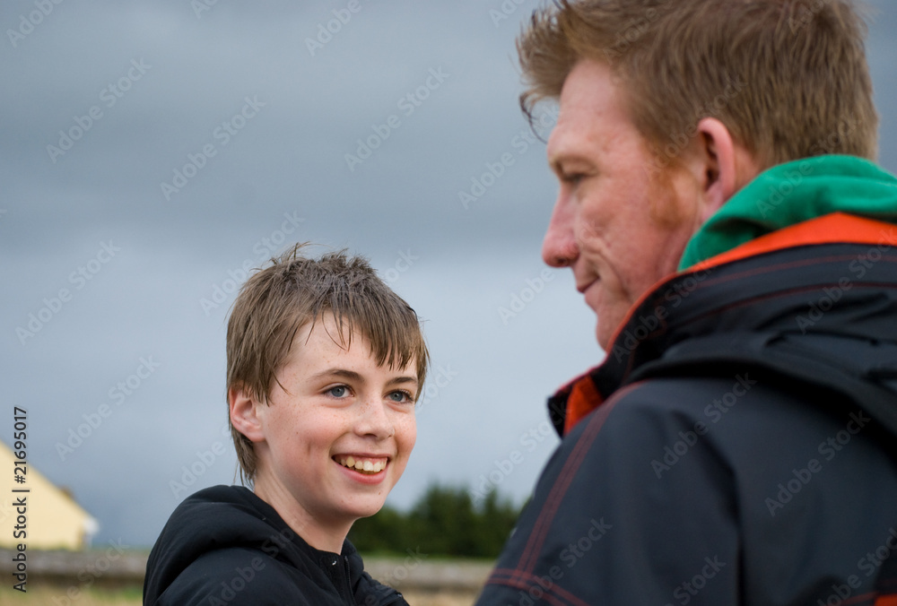 Father and Son interaction in an outdoor setting. Father and Son interaction in an outdoor setting.
