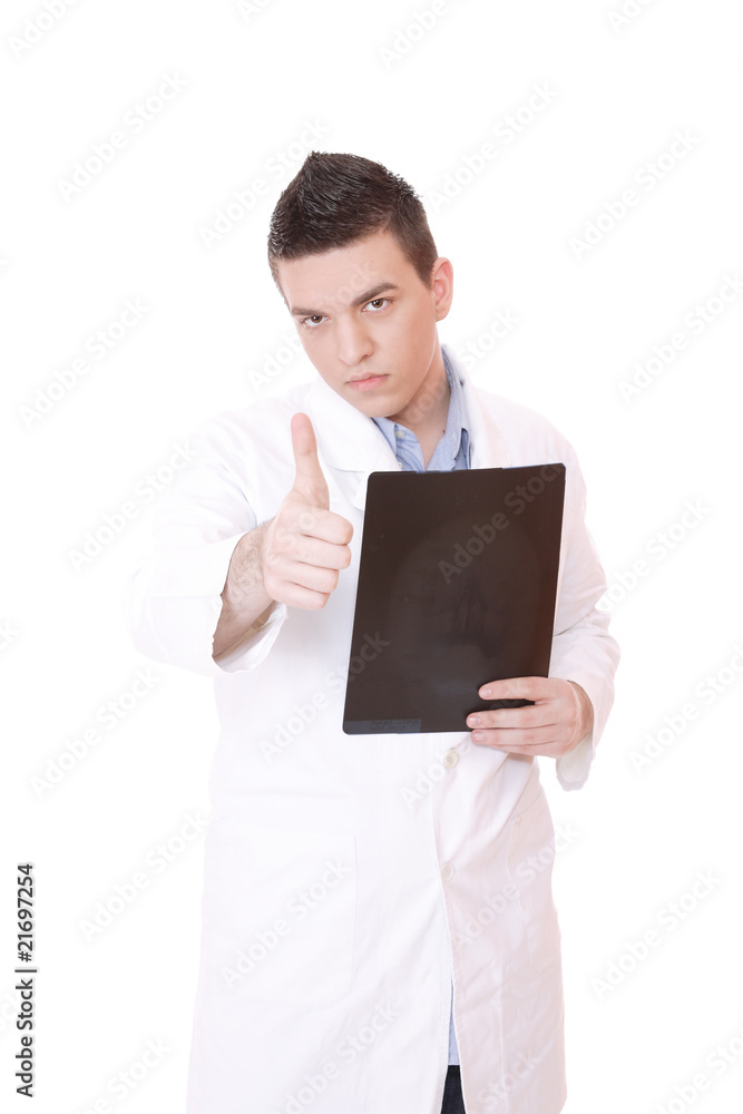 Caucasian mid adult male doctor holding up xrays. Caucasian mid adult male doctor holding up xrays.