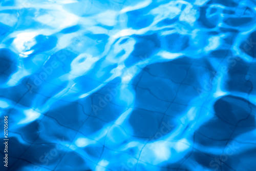 pattern of clean water in a blue swimming pool