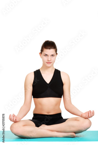 smiling woman doing yoga