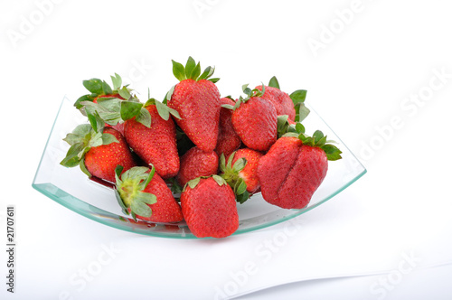 strawberries in glass bowl