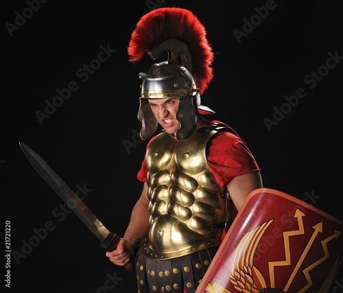 Angry legionary soldier with a gladius and shields