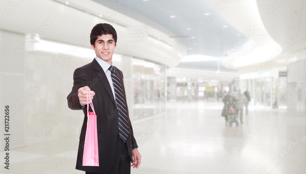 A happy shopping man A happy shopping man