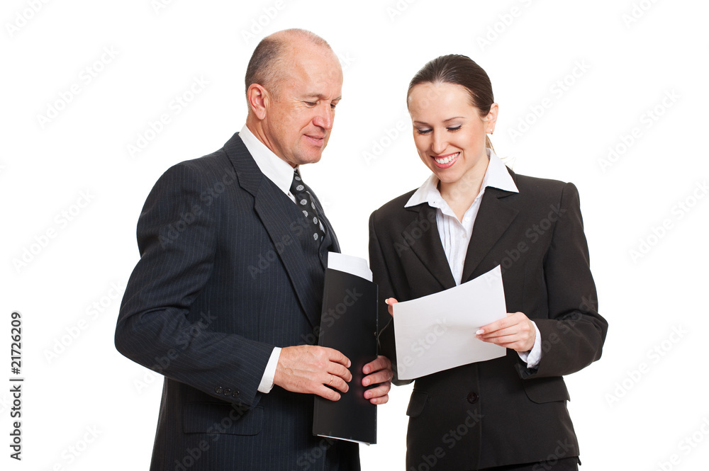 director and secretary looking at documentation director and secretary looking at documentation