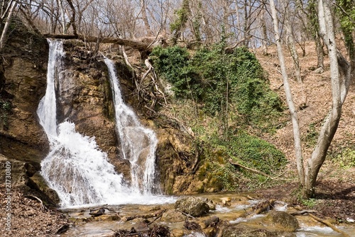 fallin spring river in a mountain canyon photo