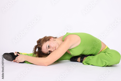 Young woman doing stretching exercise