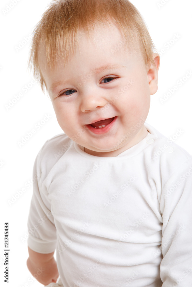 Portrait of a laughing kid in white
