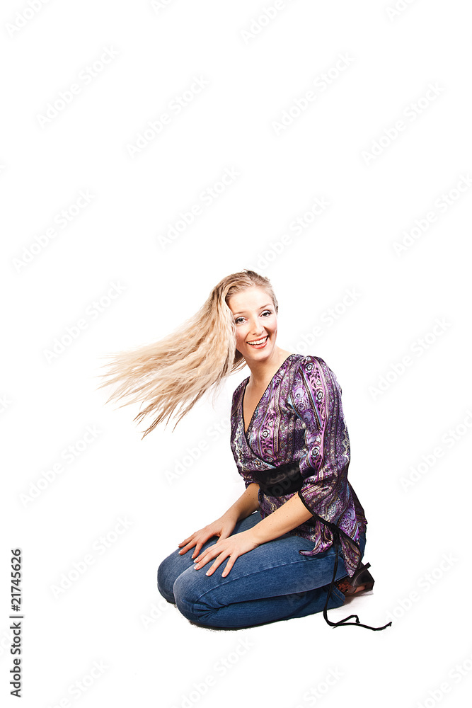 Fototapeta premium Woman sitting in studio