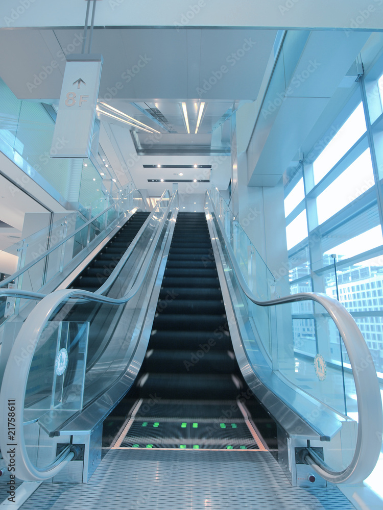 Escalator in department store Escalator in department store