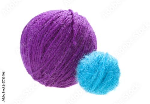 white and yellow balls of yarn on a white background