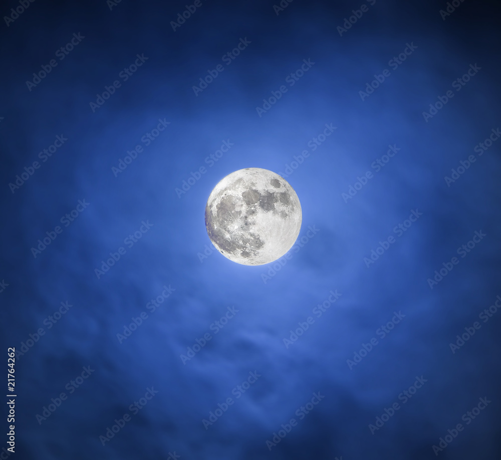 The moon in the dark blue night sky
