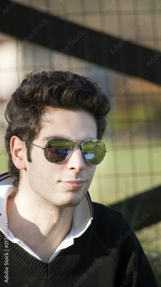 Ragazzo con occhiali da sole Stock Photo | Adobe Stock