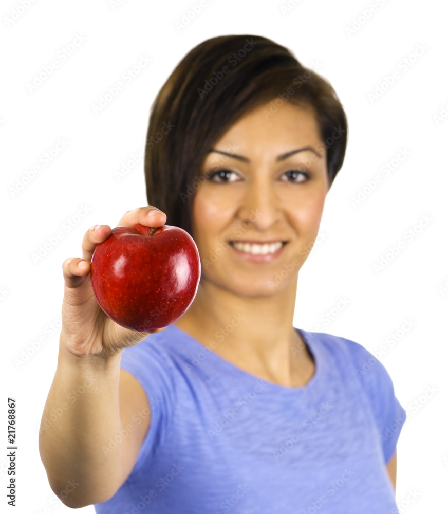 Young, ethnic woman holding a red apple Young, ethnic woman holding a red apple
