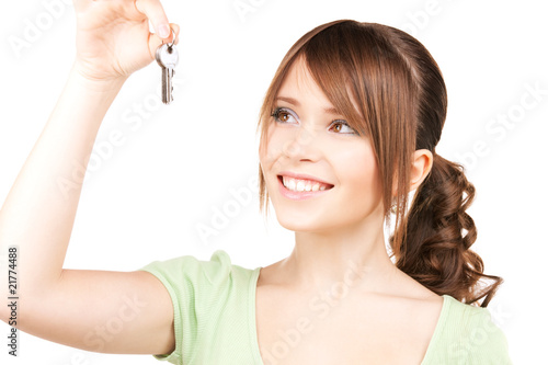 happy teenage girl with keys