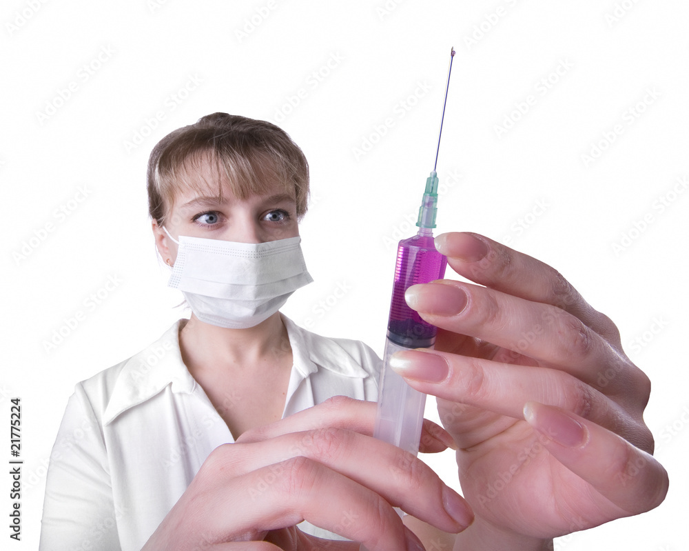 female doctor with mask holding syringe female doctor with mask holding syringe
