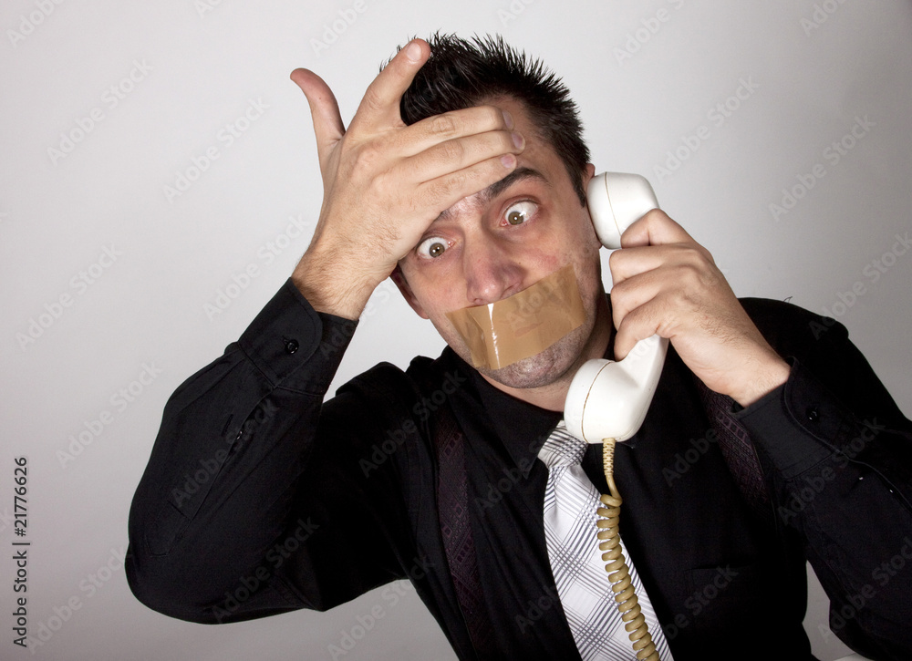 Funny businessman with tape on his mouth Funny businessman with tape on his mouth