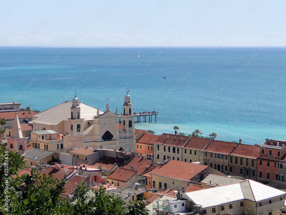 church aerial view with bright blue sea