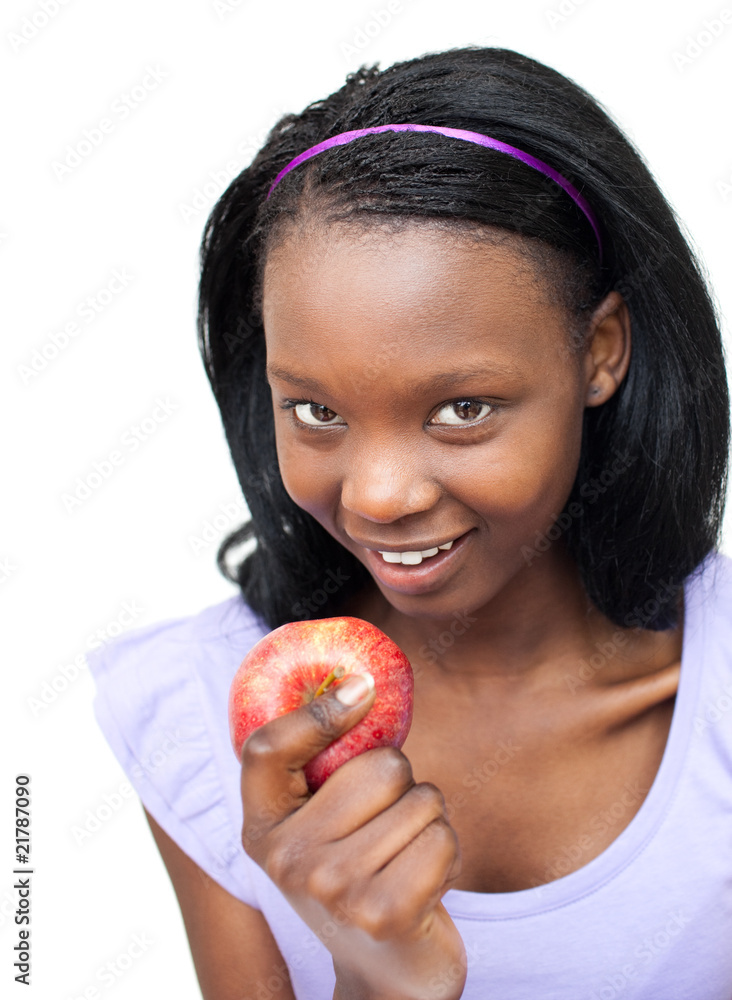 Attractive young woman eating an apple Attractive young woman eating an apple