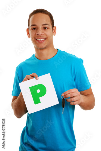 Boy holding P plate and car key photo