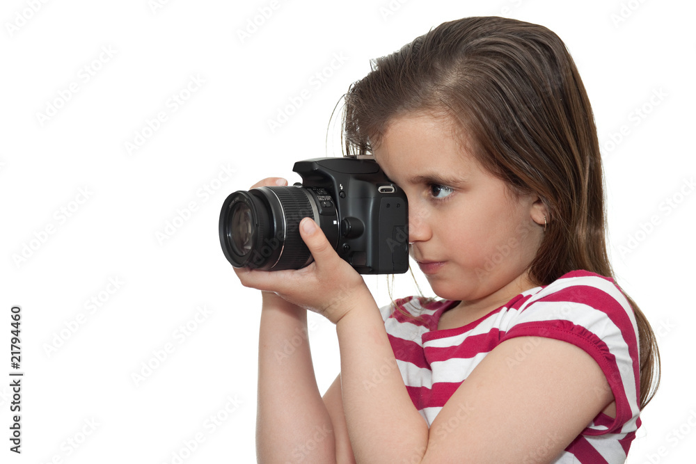Young girl taking a picture with a professional camera Young girl taking a picture with a professional camera