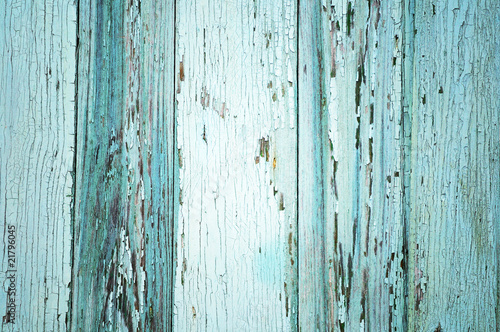 Light blue painted threadbare wooden plank